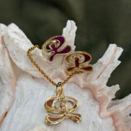 Conjunto Indalo de pendientes y colgante de metacrilato en oro