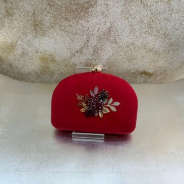 Bolso fiesta rojo con broche de lujo